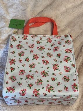 kate spade White Floral Cosmetic Tote with Orange Handles
